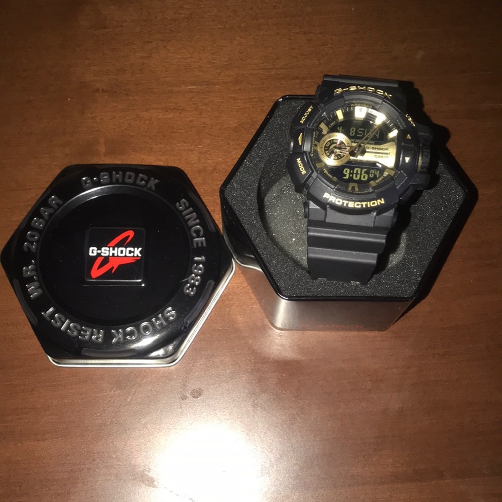 G-shock men’s watch black and gold. Worn 2 times.